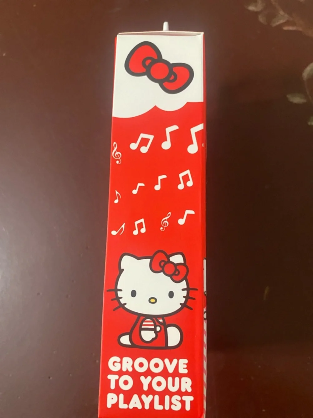 Hello Kitty Red and White Bluetooth Earbuds with Character Charging Case